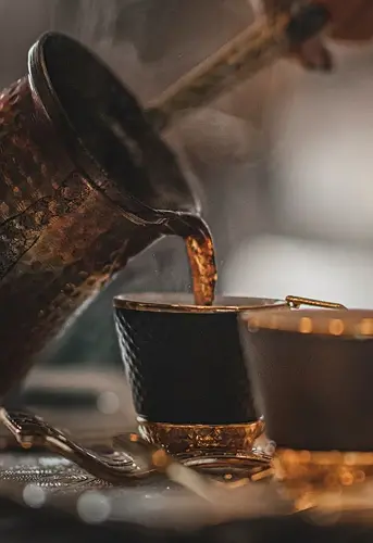 Share Arabic coffee in Amman